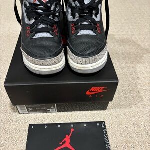 Nike Air Sneakers with Red and Black Accents